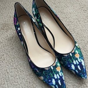 Multi- colored floral pumps. Size 9.5. Never worn.